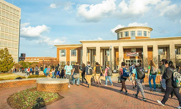 Students walking on campus.